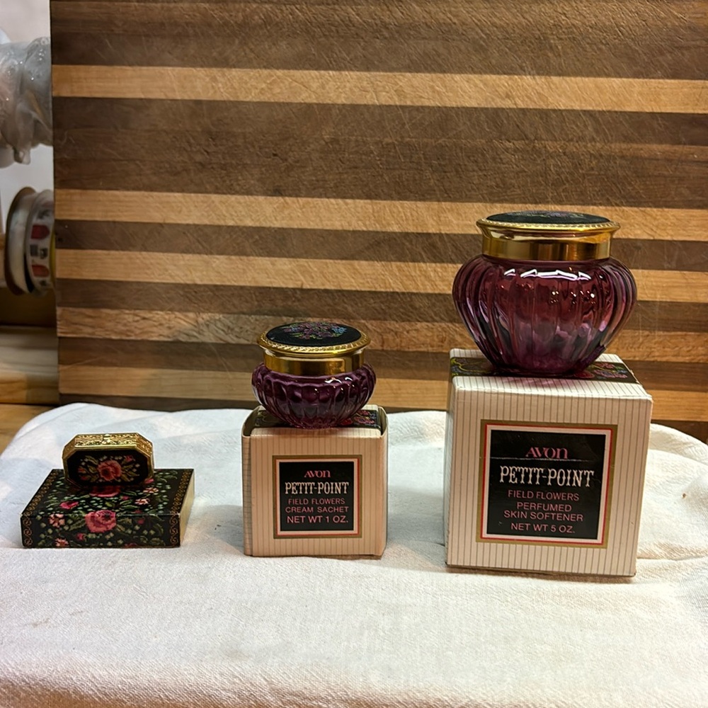 Vintage Avon empty bottles with a pill case